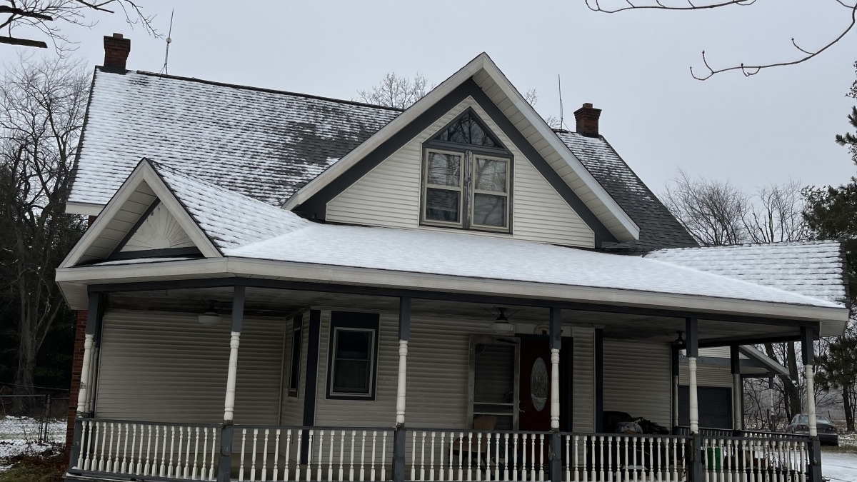 House with large wrap around porch 