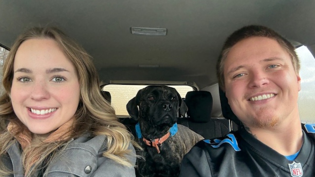 Picture of couple with dog.