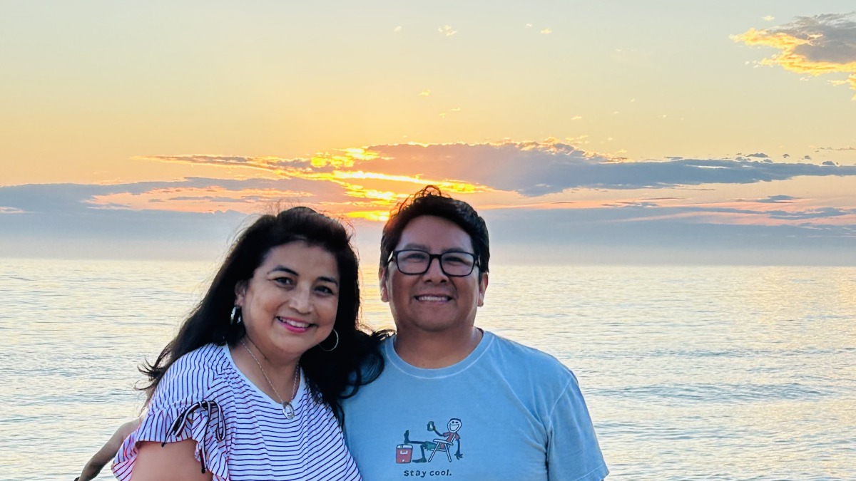 Me and my wife Connie. Sunset in lake Michigan, Oval beach 