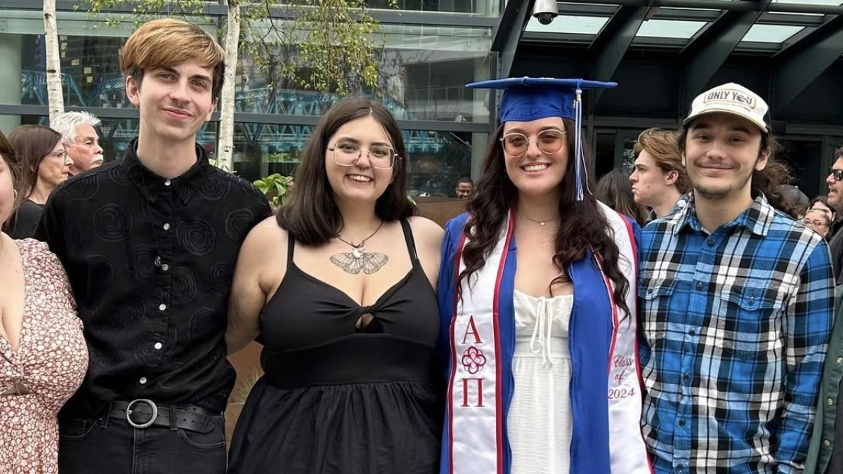 Assorted men and women at college graduation 
