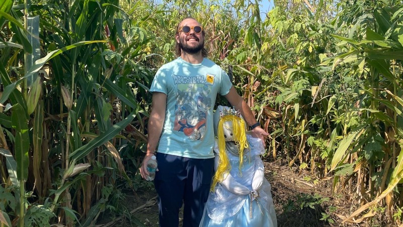 A man standing in a cornfield 