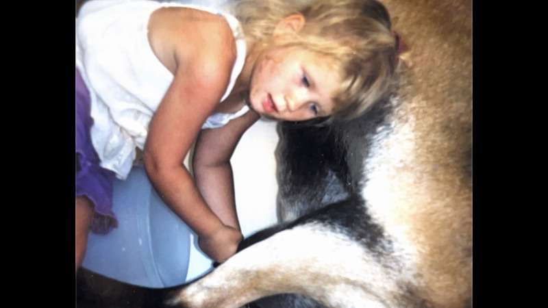 Milking goat as child