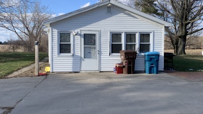 Side view of farmhouse from driveway.