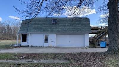 Detached 24x32 2-car garage features a heated upper loaft.  Perfect as hunting camp headquarters, guest suite or rental.  Includes 2 bed, 1 bath, kitchen and raised deck.