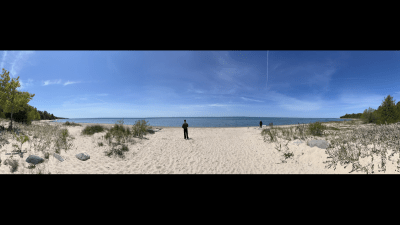 Within walking distance from the shores of Lake Michigan and the beautiful beach and trails of Antrim Natural Area.